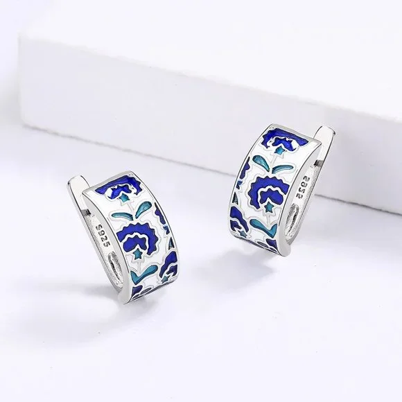 Sterling silver earrings with blue acrylic accents. - Picture 5 of 5